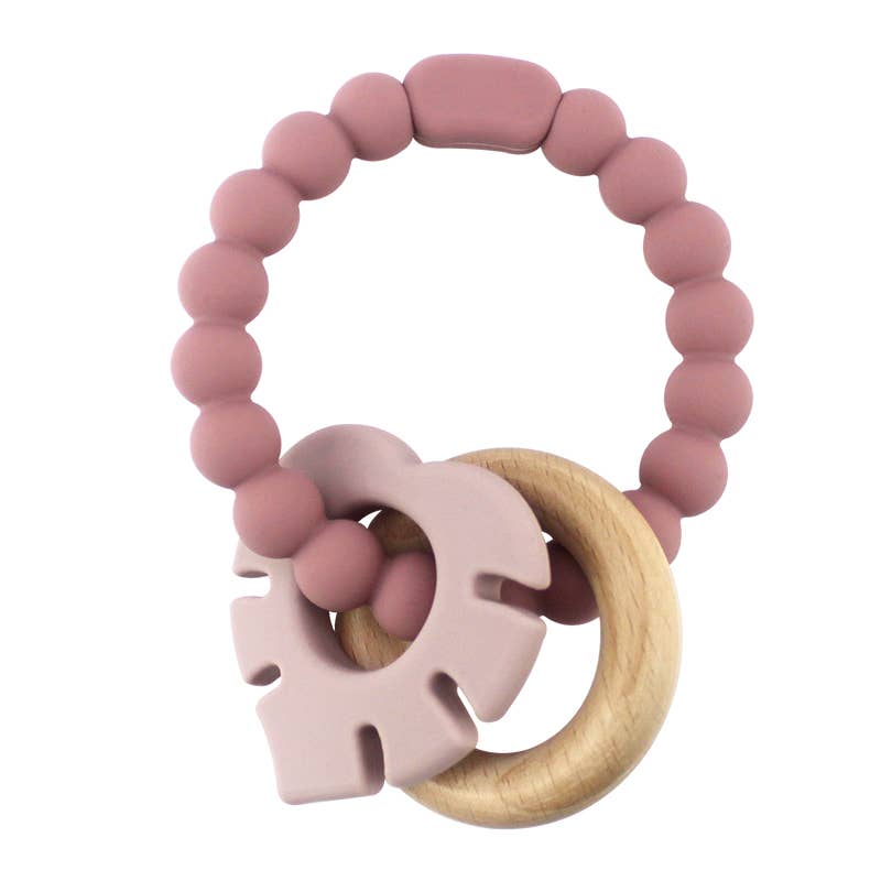 Bijtringarmband met houten ring en blad, stoffige roos
